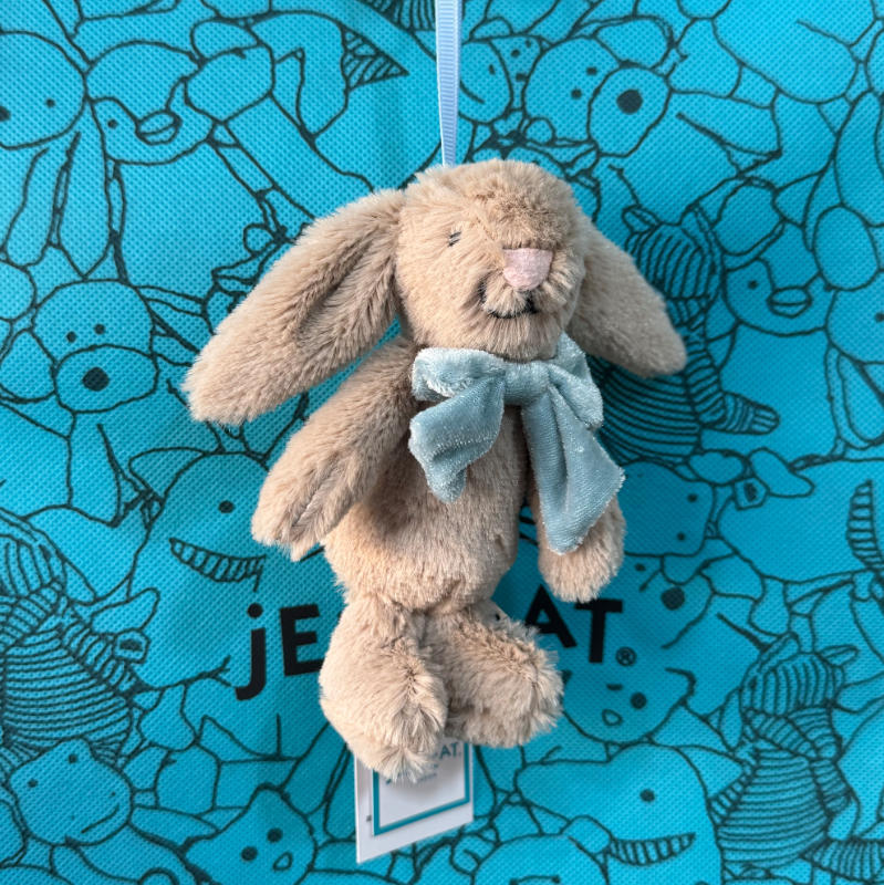 Bow tie brown rabbit pendant