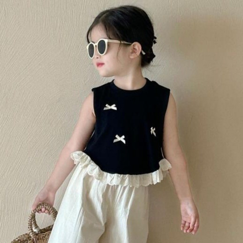 검은색 나비 조끼