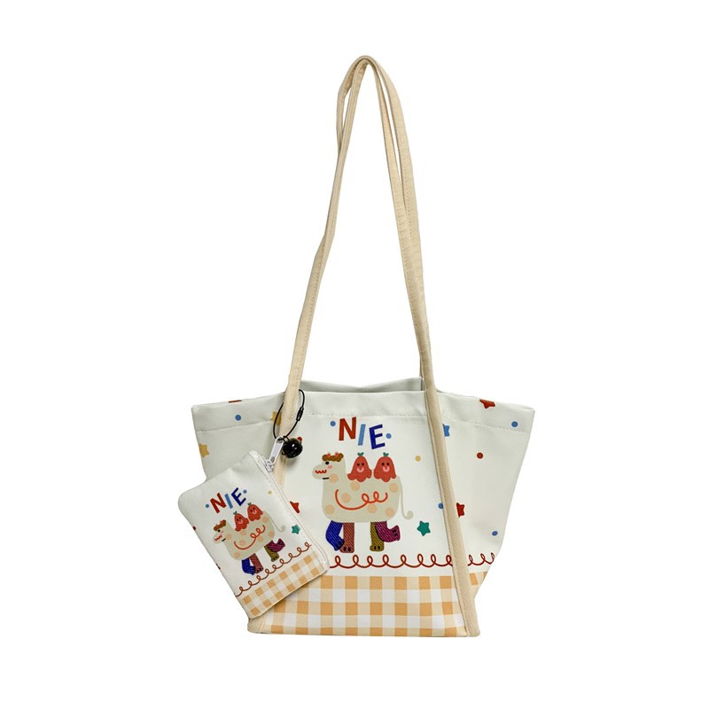 Bolsa de lona de dibujos animados japoneses 2025 nuevo bolso de gran capacidad para estudiantes de escuela primaria bolso de hombro para hombres y mujeres