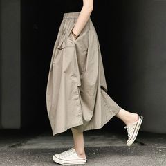 外国貿易のオリジナルの輸出カジュアルなスカートの夏のゆったりとした高腰はやせている純色を示しています。