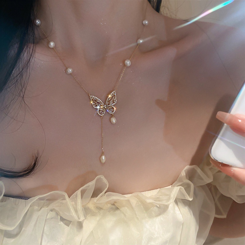 Necklace with butterfly from pearl