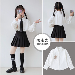 A spring and autumn style Lolita baby collar dress with a white blouse, designed as an inner layer for a JK uniform, featuring a white long-sleeved shirt with a sense of design for girls.