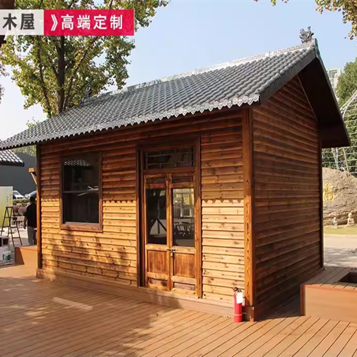 户外防腐木民宿木屋仿古茅草售货屋保安亭别墅庭院移动小型木房子
