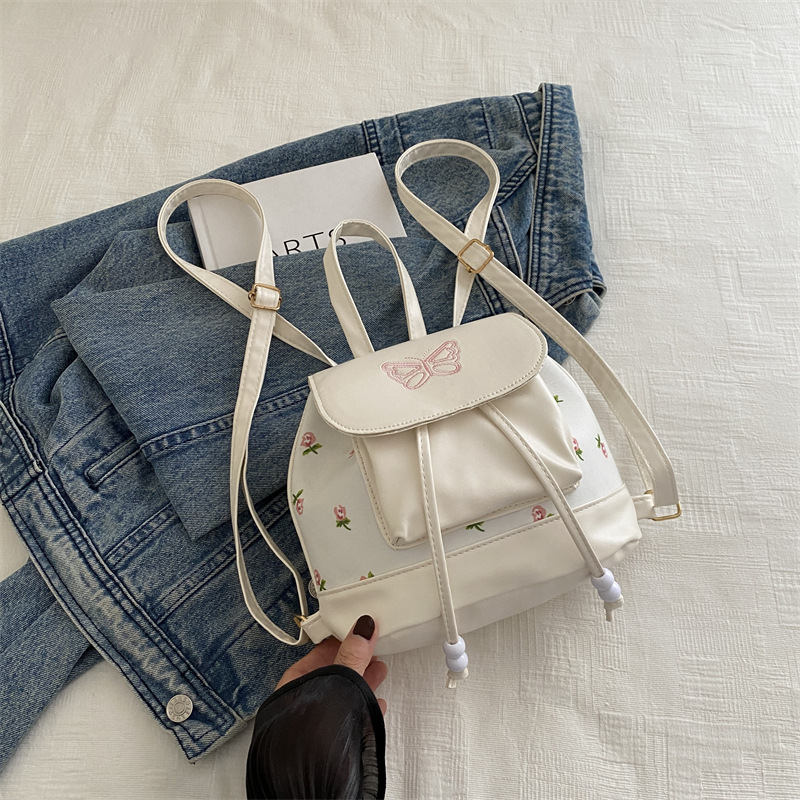 Mochila para niñas 2024 nuevo estilo de diseño de moda nicho mini pequeño blanco ligero lindo mochila de compras