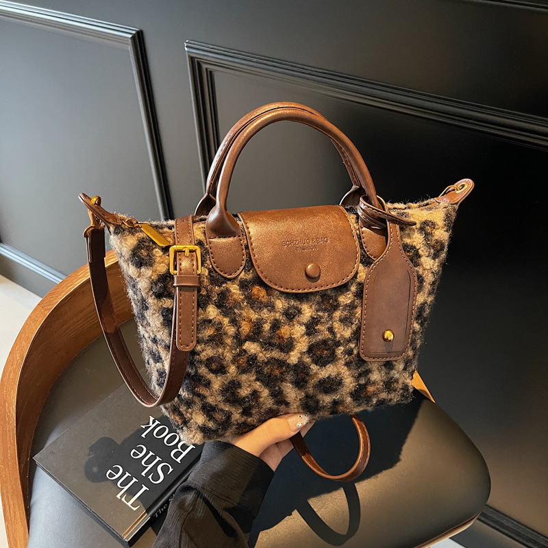 Bolso de mano con estampado de leopardo de moda retro de comercio exterior para mujer otoño e invierno nuevo diseño de nicho bolso de mensajero de gran capacidad bolso de hombro