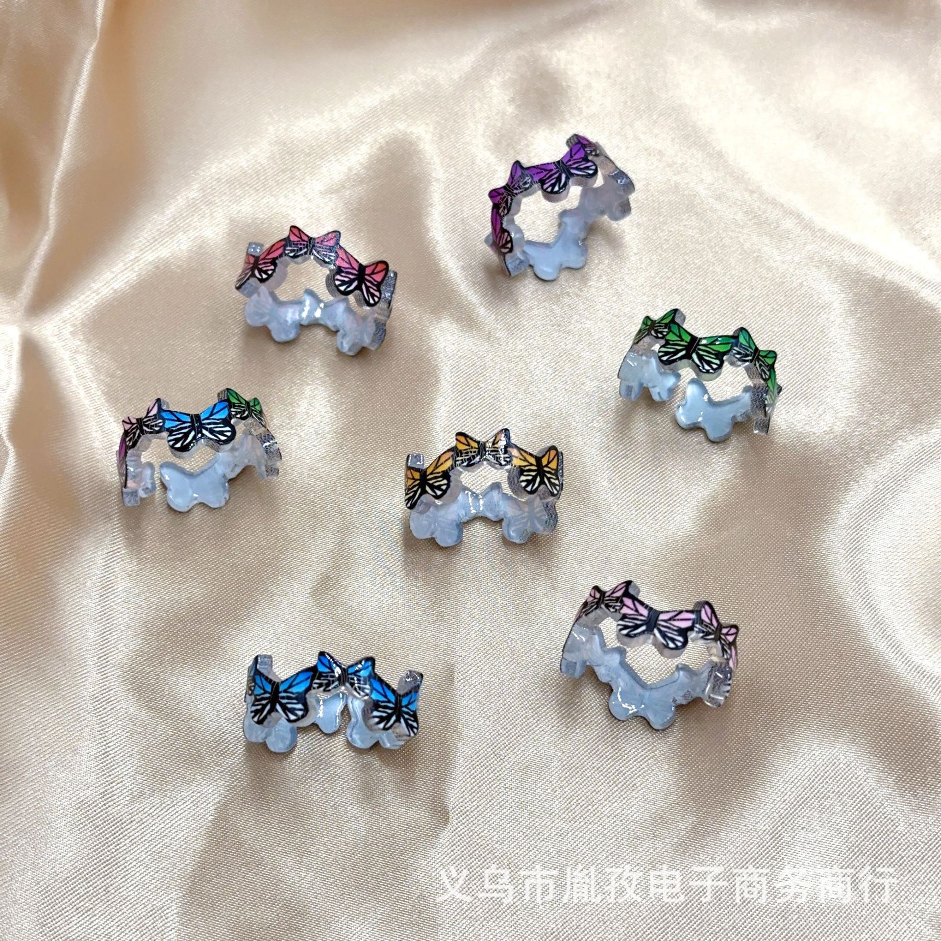 Europeo y americano transfronterizo popular irregular color transparente mariposa apertura ajustable anillo de resina acrílica estilo ins