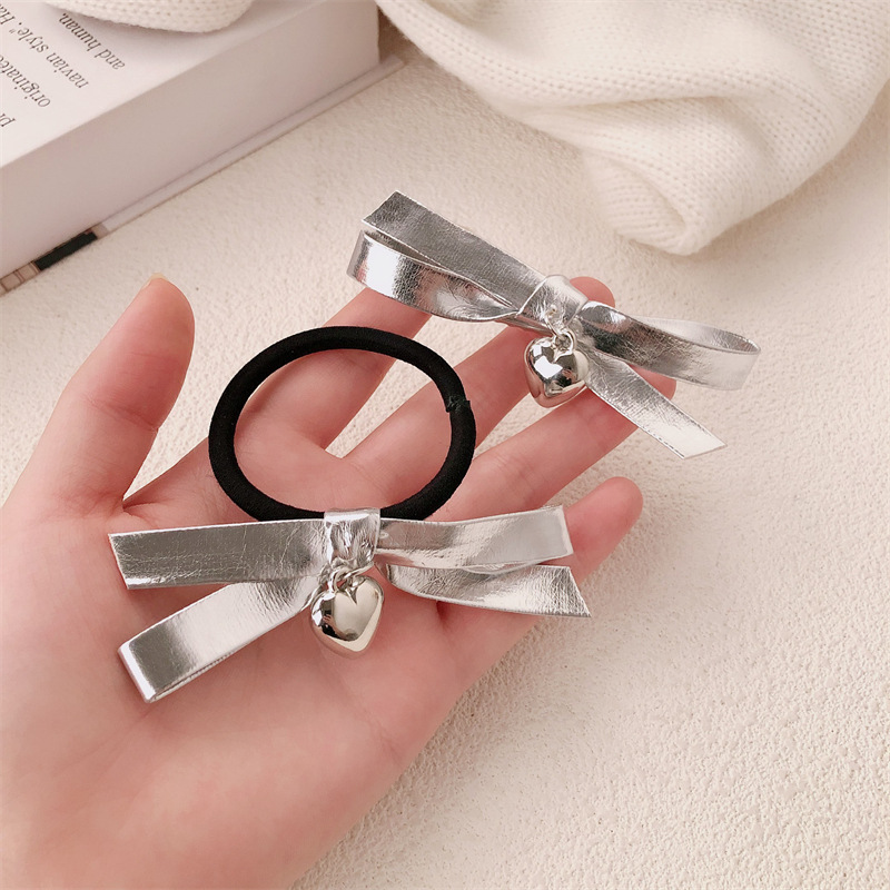 Coreano dulce cool girl plateado arco de cabello en nicho de alta sensación cuerda de cabello amor correa de cabello adornos para el cabello