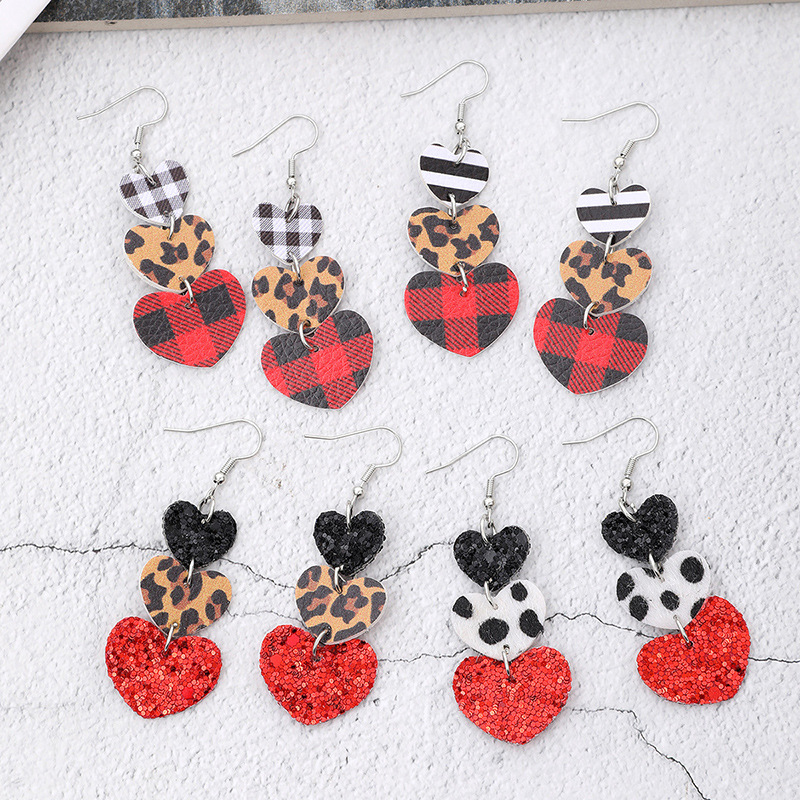 1 Pair Simple Style Commute Heart Shape Printing Pu Leather Drop Earrings display picture 1
