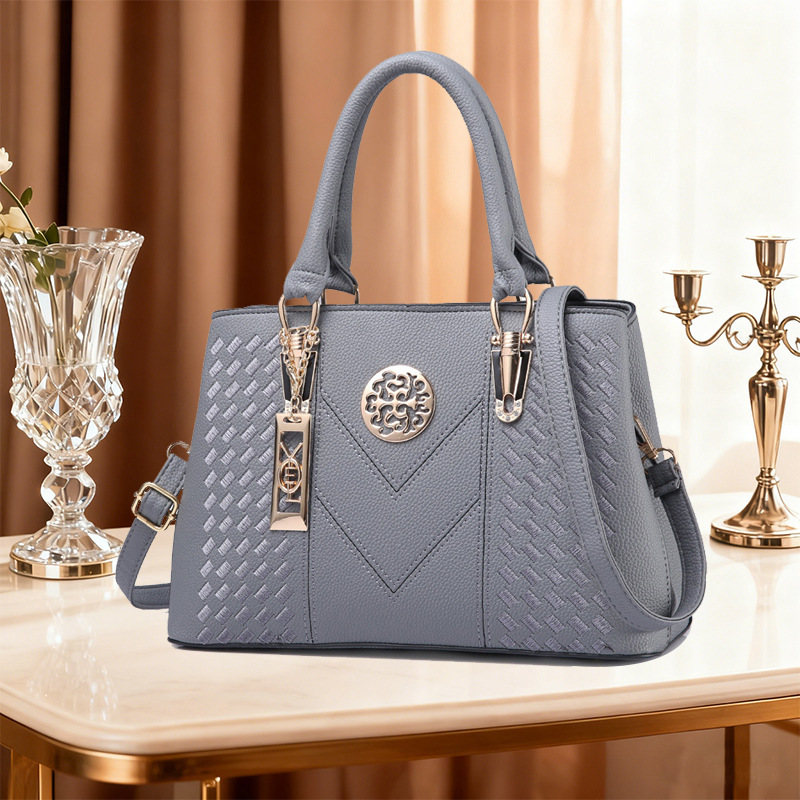 Bolsas de mujer transfronterizas 2025 nueva moda universal bolsas de mujer bordadas de gran capacidad de hombro mochila al por mayor