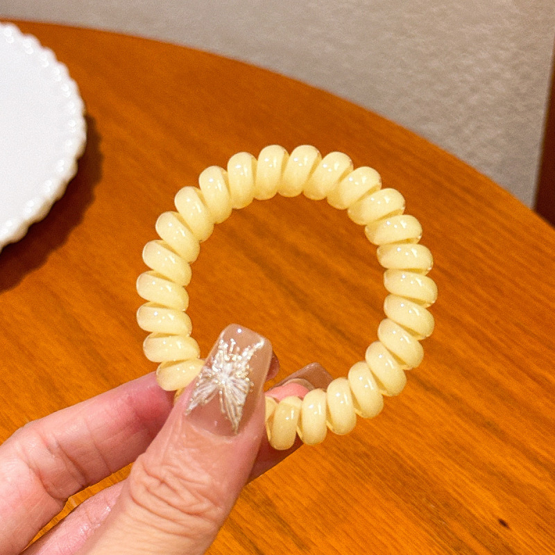 キャンディー色の電話線の髪輪の女性は高弾力で長持ちします。|undefined