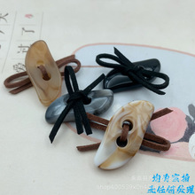 绒绳打蝴蝶结异性亚克力造型装饰扣子两眼异形大衣风衣时尚纽扣