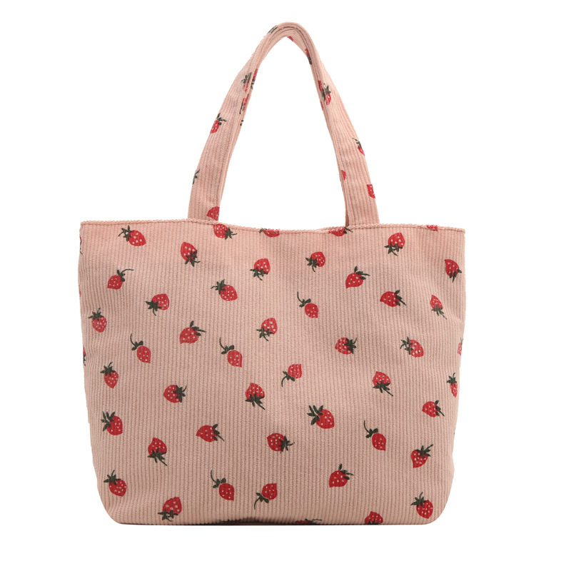 2026 nuevo bolso de transporte de gran capacidad impresión de fresas bolso de hombro de estudiantes