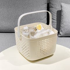 手に持っている風呂かごの浴室の洗濯用品は物かごの学生専用の軽い贅沢な風呂かごの四角形の水たまりの入浴かごを置きます。