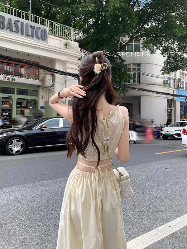 Seaside Niche Design Sense Hollow-out Open-waist Halter Halter Dress Women's Summer Tight Waist Slimming Tassel Long Dress