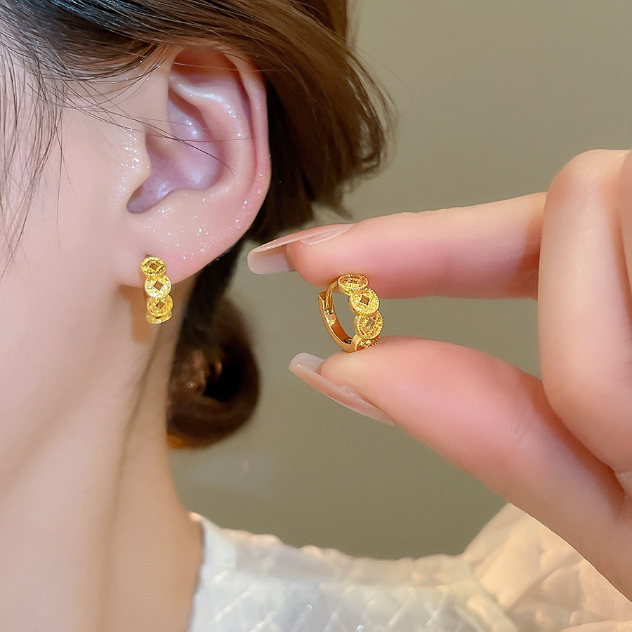 Pendientes de flores tridimensionales con lentejuelas de aguja de plata Pendientes de lujo ligero de alta gama de moda de nicho Pendientes de viento frío al por mayor
