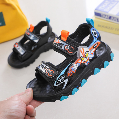 Factory direct supply of Ultraman Sandals for Boys  Summer New Luminous Soft Sole Baby Sports Running Beach Shoes