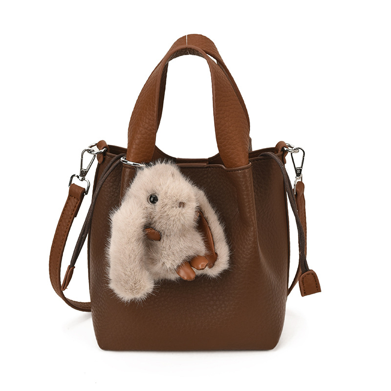 Bolso de mano retro de alto nivel, bolso de balde de agua universal para mujeres 2025, nuevo estilo coreano de invierno para niños y madres, bolso de hombro.