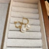 Golden earrings, 32