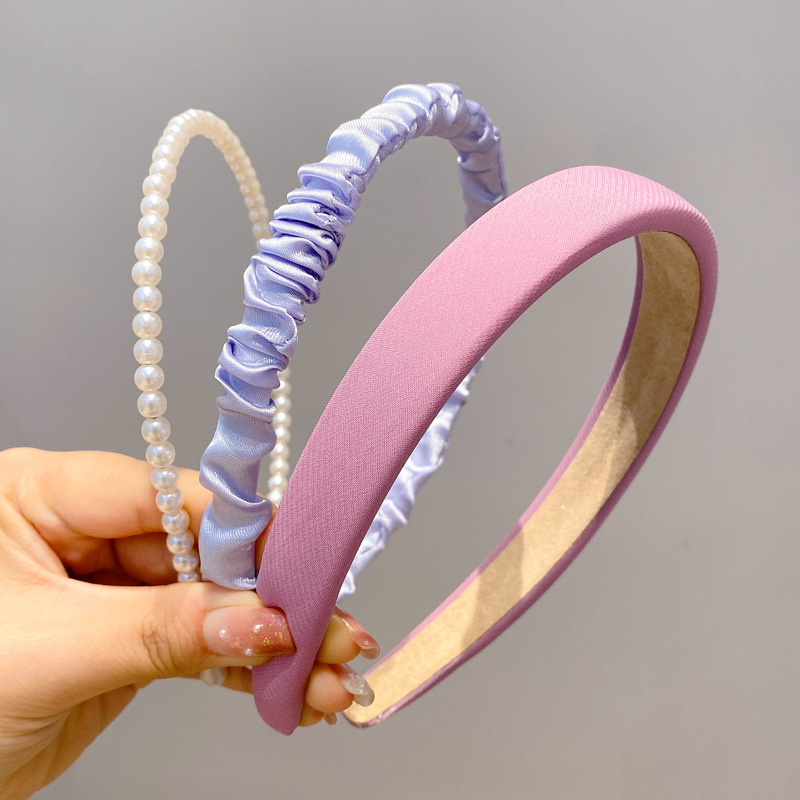 A principios de la primavera, la banda de cabello para mujeres en línea, 2025 nuevo lavado de cara de presión de tarjeta de cabello para el cabello, banda de cabello de perlas, banda de cabello para mujeres.