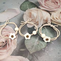 Milk tea-colored Instagram-inspired floral hair ties for women—perfect for ponytails, forest-style hair bands, and elegant, minimalist hair ropes.