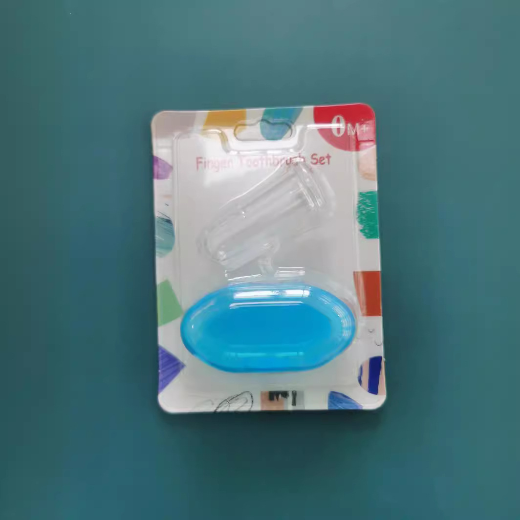 Cepillo de dientes de silicona para bebés Cepillo de dientes de manga de dedo Piel suave Revestimiento de lengua de silicona Limpieza oral Cepillo de dientes de mama en caja Embalaje inglés