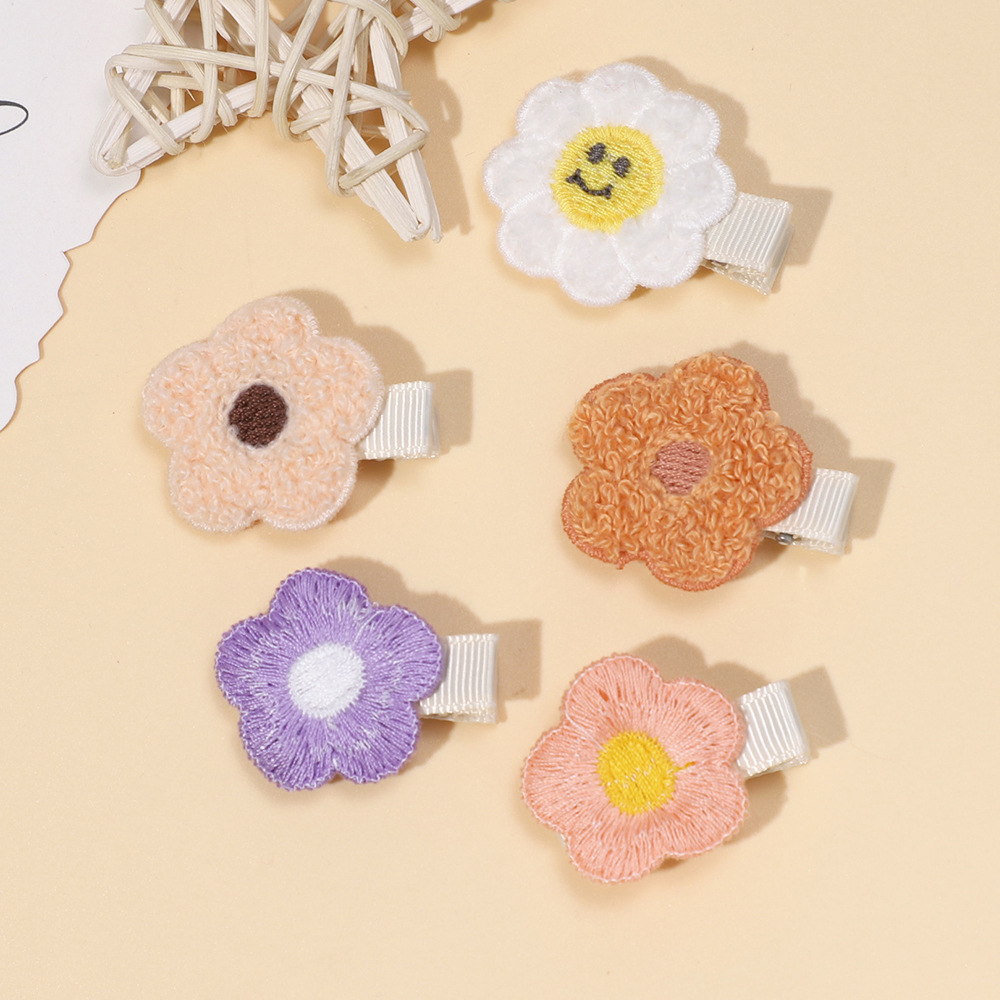 Foreign trade new children's hairpin European and American cute baby five-petal flower side clip girl's flower does not hurt hair full bag hairpin_voghion.com