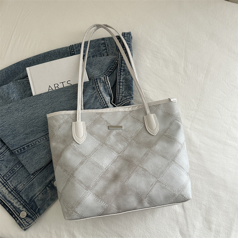 Casual retro bolso de gran capacidad para mujeres 2024 nueva moda moda bolso de hombro de tendencia de textura universal bolso de viaje