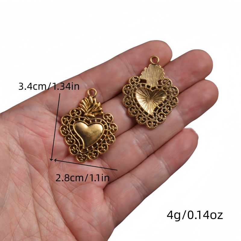 Transfronterizos 10 estilos de oro antiguo colorado colgante de aleación del corazón sagrado DIY encanto joyería accesorios metálicos