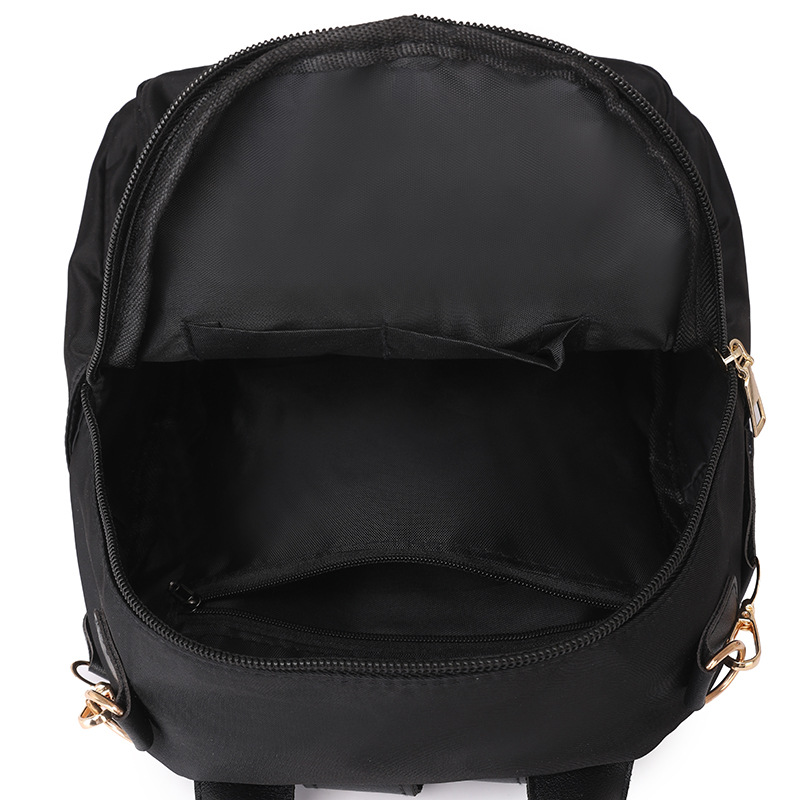 Bolsos para mujer 2025 nuevo estilo casual de dibujos animados para mujer mochila simple y versátil para viajes ligeros mochila de gran capacidad para mujer