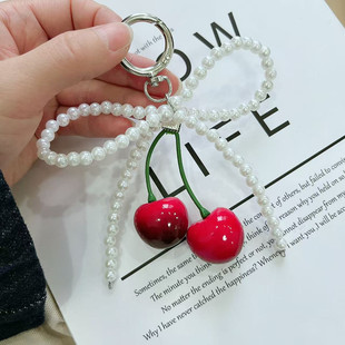 Spring new exquisite temperament sweet cool high color value cherry pearl bow key chain cherries bag pendant