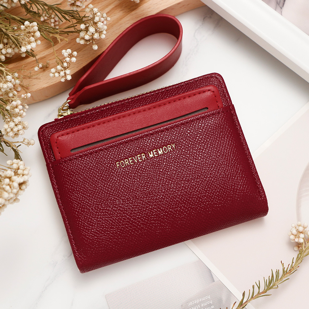 Nueva billetera corta de mujer fresca y simple doble cremallera bolso de cambio multi-tarjeta bolso multifuncional