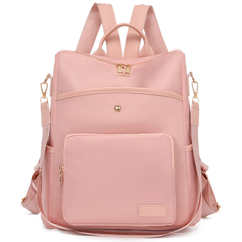 Mochila de tela Oxford nueva transfronteriza para mujer Mochila de moda estilo coreano retro mochila de viaje de moda con remaches simples