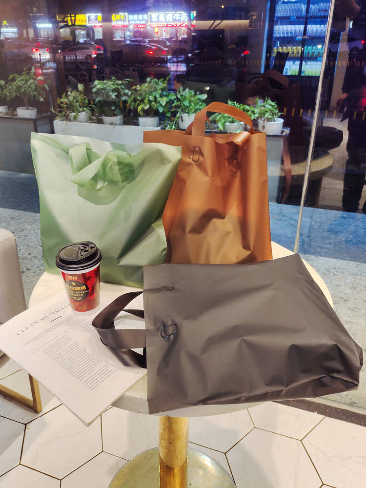 磨砂半透明服装店手提袋衣服购物袋礼品包装塑料胶袋LOGO