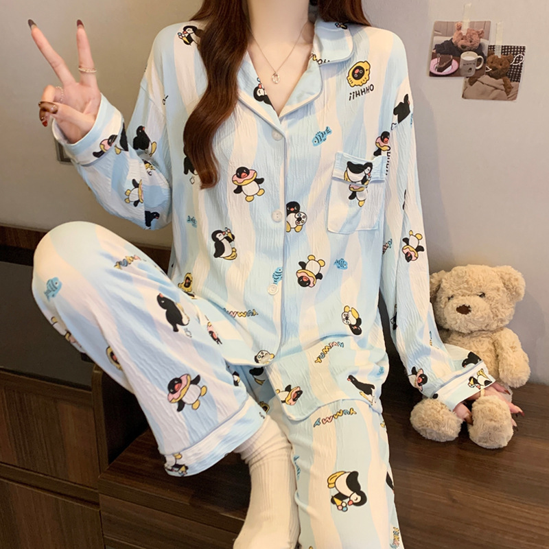 蝶結びのさくらんぼのプリントの女性のパジャマの春と秋の新型のカーディガンの長袖のズボンの部屋の服のスーツは実際に卸売りをたたきます。|undefined