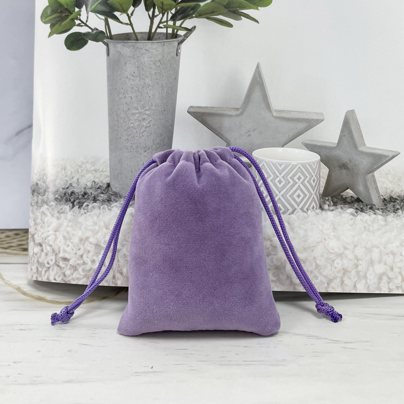 Bolsa de franela de joyería al por mayor venta directa de fábrica de cosméticos auriculares banco de energía a prueba de polvo almacenamiento bolsillo de cordón de joyería