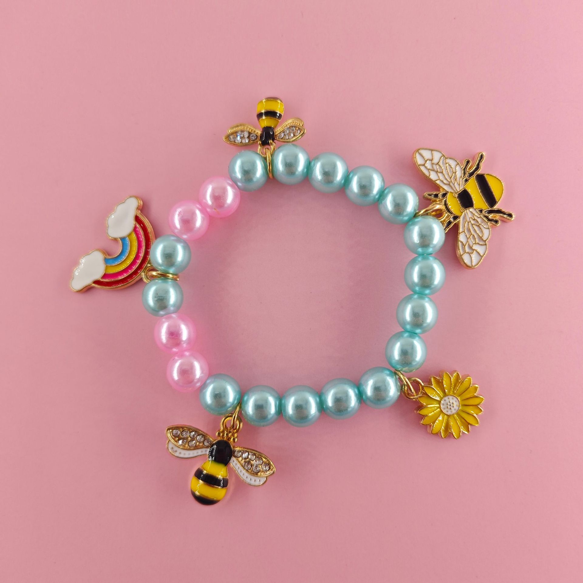 Transfronterizo Amazon nueva pulsera de dibujos animados para niños pequeña margarita abeja colgante de arco iris pulsera variedad de joyas de amistad