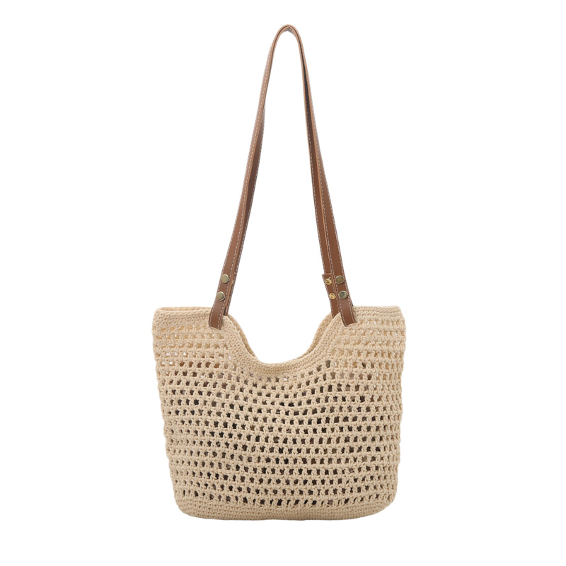 Bolsas de paja transfronterizas bolsas de mujer 2025 nueva moda simple gran capacidad bolsa de hombro hueco bolsa de playa bolsa de bolsa