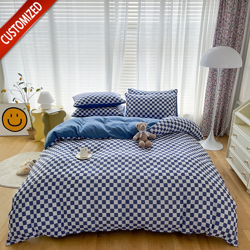 Juego de sábanas de algodón lavado cepillado de cuatro piezas, estilo primavera y otoño, color liso sencillo, juego de cama de alta gama, lujo personalizado al por mayor.