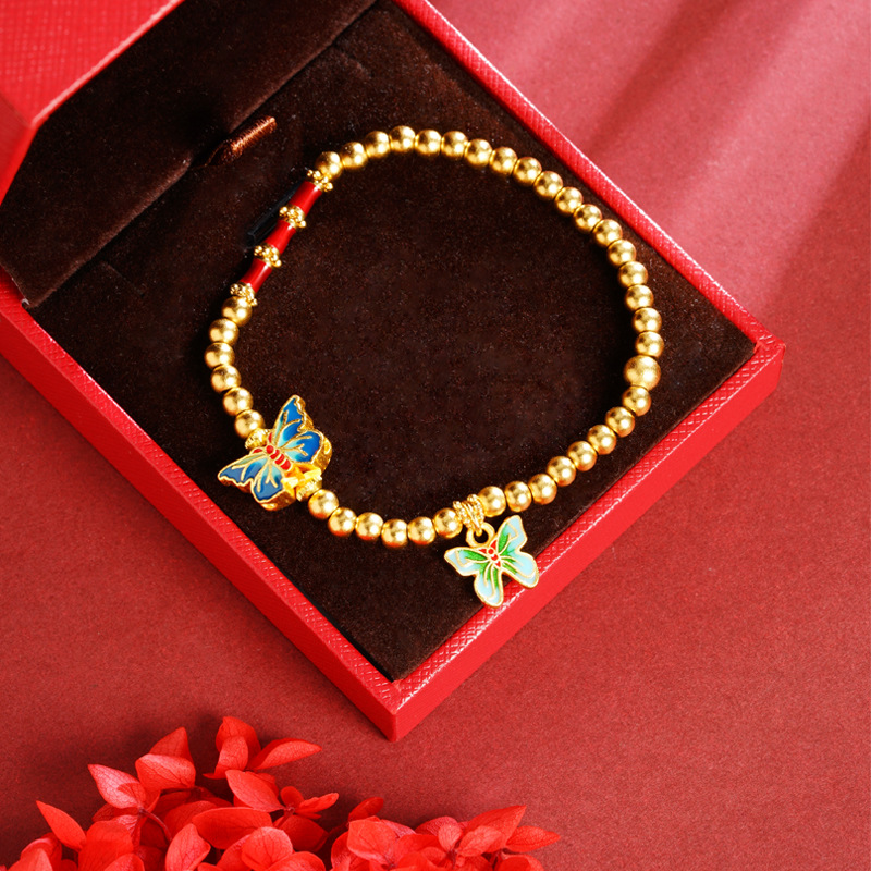 Brazalete de mariposa de esmalte de oro de arena vietnamita no se desvanece durante mucho tiempo. nuevo estilo chino retro nicho sensación de diseño de joyería de cuentas
