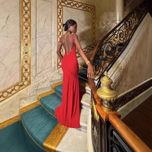 速卖通2025欧美风新款女装气质吊带一字领性感露背修身长款连衣裙