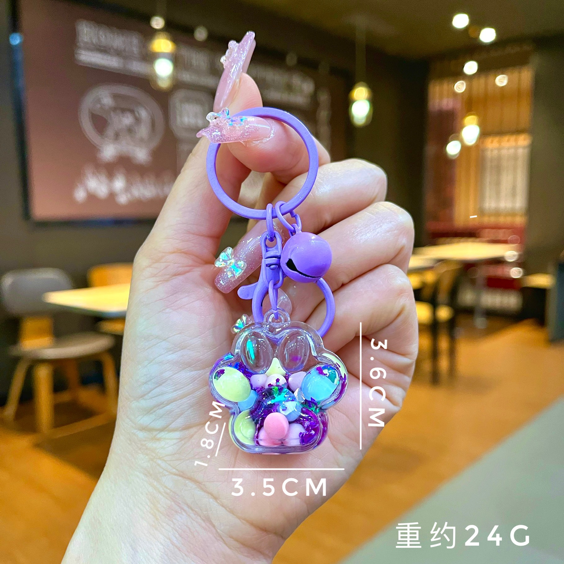 Aceite de gato garra arenas movedizas llavero lindo dibujos animados cadena colgante captura muñeca máquina agarrar pequeño regalo al por mayor