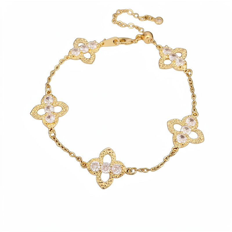 Flores de hierba afortunada de Zhengzhou pulsera hueca ligera pulsera de nicho de lujo personalidad temperamento moda joyería al por mayor