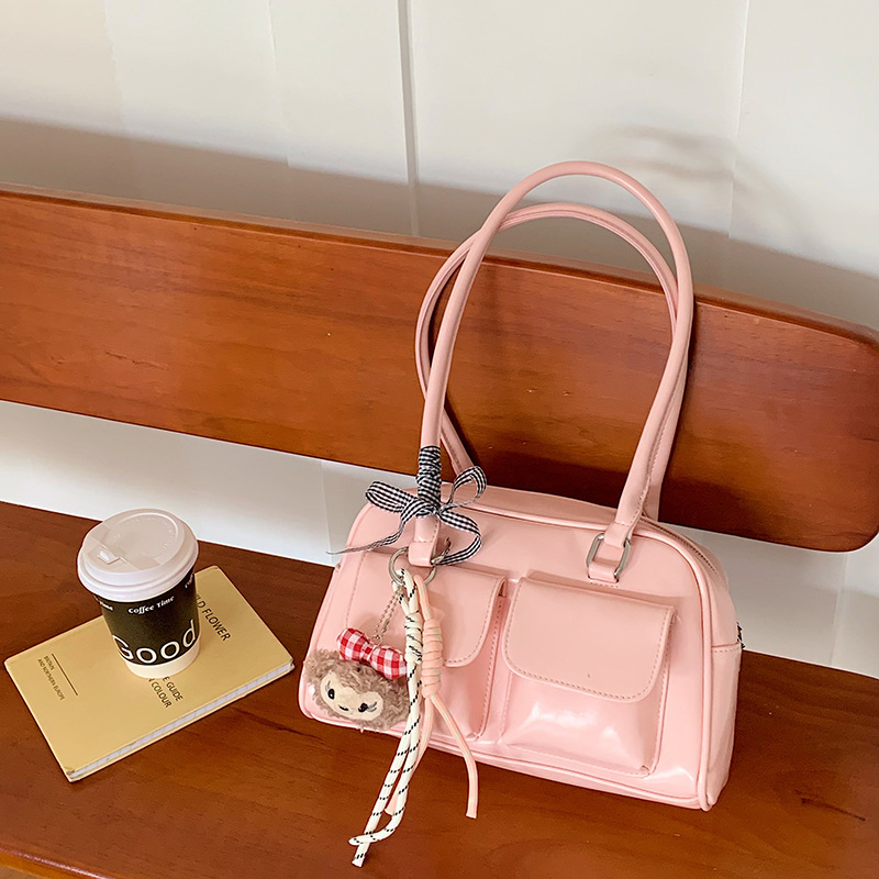 La moda coreana de nicho de estilo extranjero bolsas de palos debajo de las axilas para mujeres 2026 primavera nueva bolsa diaria de Boston bolsas de bolos