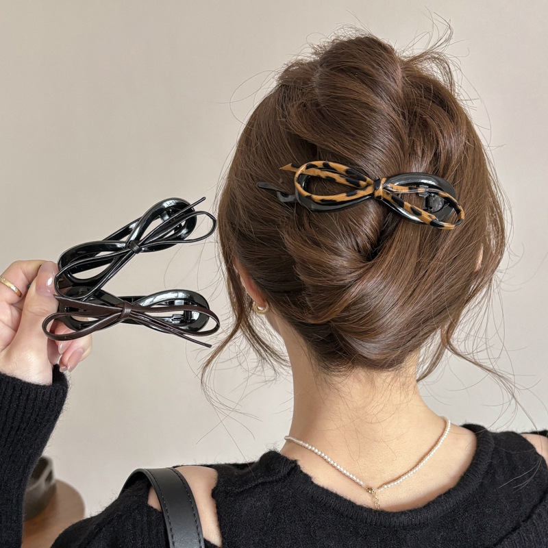 Alto grado de sensación de leopardo arco torsión clip de cabello temperamento disco de cabello una palabra agarrar clip de cabello para mujeres 2025 nuevo toque de cabello
