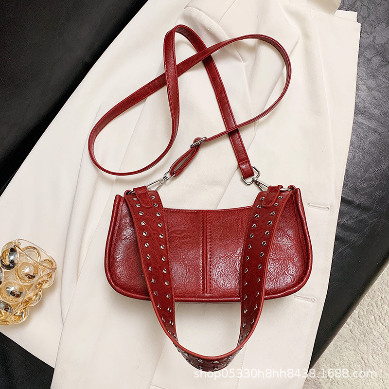 Bolso de moda ins de personalidad de nicho para mujer 2024 bolso de bola de masa láser brillante de otoño bolso de hombro de alta gama