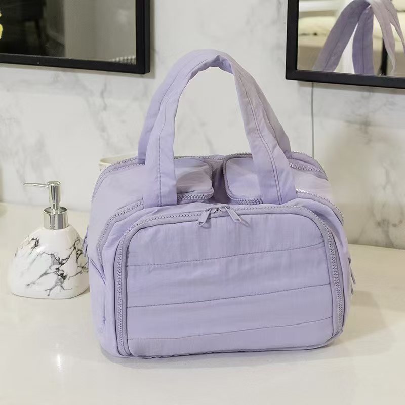 Xiaohongshu 同じスタイルの女性用化粧品バッグ、大容量のスキンケア製品収納バッグ、化粧ブラシパーティション、旅行用トイレタリーバッグ|undefined