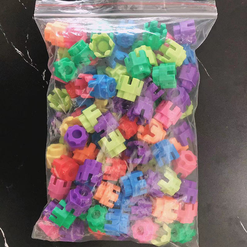 子供の六角形の積み木のプラスチックの益智のおもちゃの3-6歳の女性の男の子の啓蒙のデスクトップは組み合わせて六角を挿します。|undefined