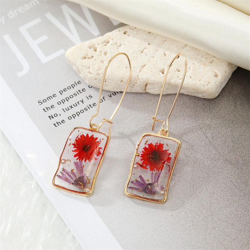 1 Pair Quantity 1 Pair Simple Style Dried Flower Epoxy Transparent Synthetic Resin Alloy Dangling Earrings