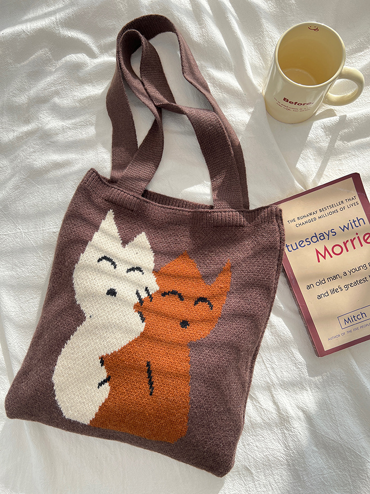 Cute universal demi-season capacious knitted one-shoulder bag