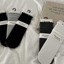 Hilo nayean南业袜子女秋冬新款纯色木耳边休闲款堆堆袜女长筒